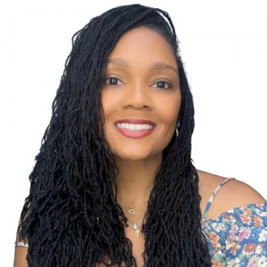 Dr. Dawn Lewis Headshot smiling with long beautiful Locs.